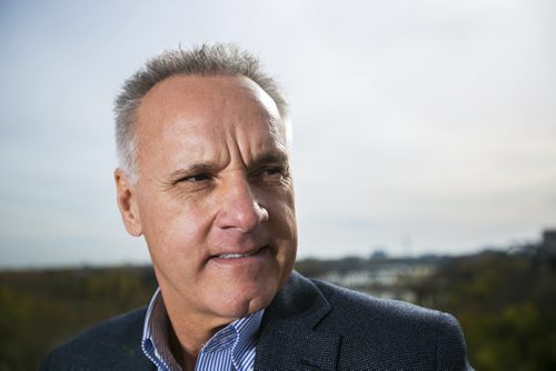 Developer Fausto Pereira poses for portraits on his balcony at The Excelsior, which he developed and now lives in, for The Rivers project  in Winnipeg on Friday, Oct. 9, 2015.  (Mikaela MacKenzie/Winnipeg Free Press)