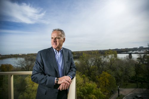 Developer Fausto Pereira poses for portraits on his balcony at The Excelsior, which he developed and now lives in, for The Rivers project  in Winnipeg on Friday, Oct. 9, 2015.  (Mikaela MacKenzie/Winnipeg Free Press)