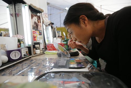 September 29, 2015 - 150929  -  Cavalier's Tomoko Charron prepares for her evening show Tuesday, September 29, 2015. John Woods / Winnipeg Free Press