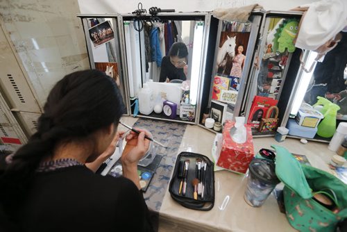 September 29, 2015 - 150929  -  Cavalier's Tomoko Charron prepares for her evening show Tuesday, September 29, 2015. John Woods / Winnipeg Free Press