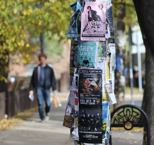 The city is planning to clamp down on postering light posts in the city. Photographed Oct. 9 on Westminster Avenue at Evanson Street. Photo by Jason Halstead/Winnipeg Free Press RE: Standup photo