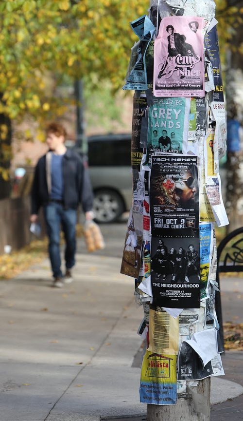 The city is planning to clamp down on postering light posts in the city. Photographed Oct. 9 on Westminster Avenue at Evanson Street. Photo by Jason Halstead/Winnipeg Free Press RE: Standup photo