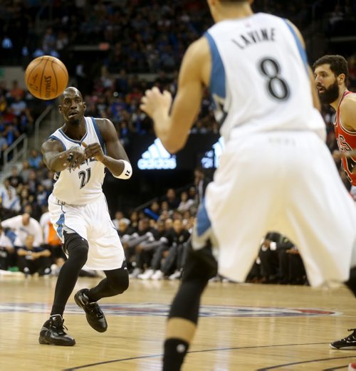 Minnesota Timberwolves' Kevin Garnett passes the ball to Zach LaVine  during an exhibition game against the Chicago Bulls at MTS Centre, Saturday, October 10, 2015. (TREVOR HAGAN/WINNIPEG FREE PRESS)