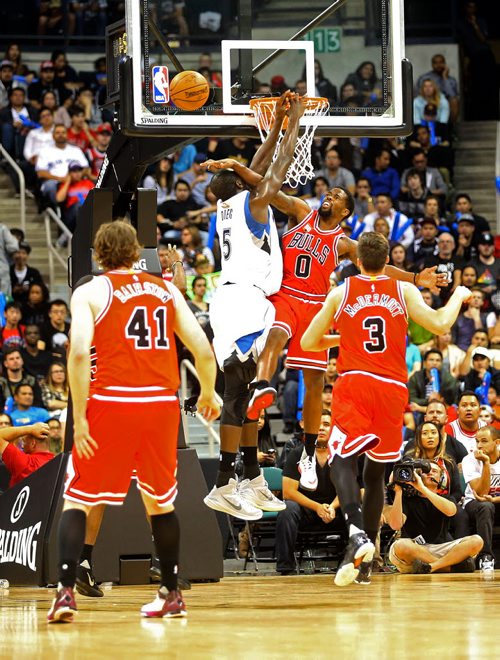 Minnesota Timberwolves' Gorgui Dieng is blocked by Chicago Bulls' Aaron Brooks during an exhibition game at MTS Centre, Saturday, October 10, 2015. (TREVOR HAGAN/WINNIPEG FREE PRESS)