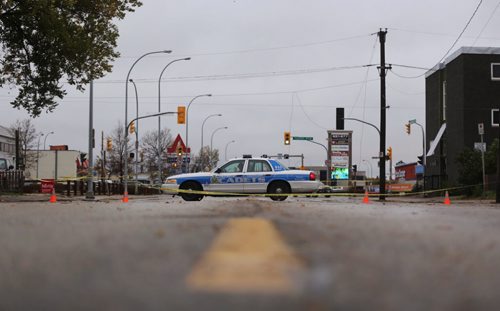 Winnipeg Police and Cadets block Stafford at Taylor due to downed power lines, Monday, October 12, 2015. (TREVOR HAGAN / WINNIPEG FREE PRESS)