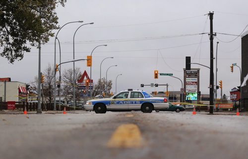 Winnipeg Police and Cadets block Stafford at Taylor due to downed power lines, Monday, October 12, 2015. (TREVOR HAGAN / WINNIPEG FREE PRESS)