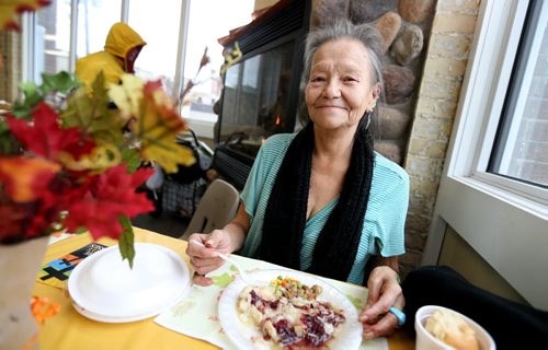 Arlene Buchberger eating during Thanksgiving at Siloam Mission, Monday, October 12, 2015. (TREVOR HAGAN/WINNIPEG FREE PRESS) for carol sanders story