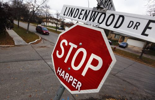 October 12, 2015 - 151012  -  A Harper sticker has been applied to STOP signs in Lindenwoods Monday, October 12, 2015. John Woods / Winnipeg Free Press