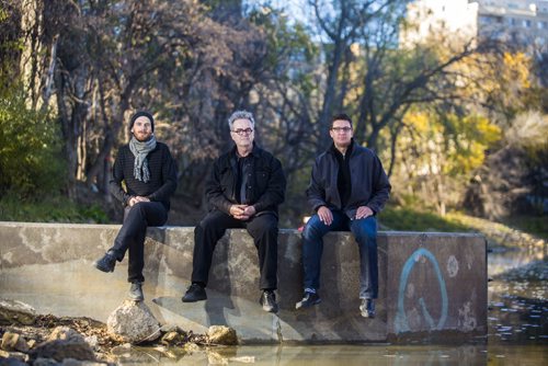 Architects Stephen Faust (left), David Penner, and Chris Wiebe, at a river access point in Winnipeg on Tuesday, Oct. 13, 2015.  Their proposal centres around a cycling "freeway" along the river.  (Mikaela MacKenzie/Winnipeg Free Press) --for The Rivers project