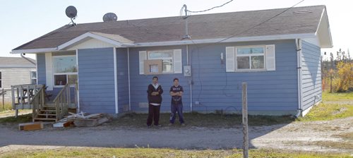 Easterville, Manitoba-Two step brothers stand in the front of the home of Shelly Lynne Chartier who tomorrow will have her day in court facing Fraud, Impersonation and Fraud charges related to a elaborate online scam which targeted several high profile victims including NBA star-See Mike McIntyre story-Oct 13, 2015  (Joe Bryksa/Winnipeg Free Press)