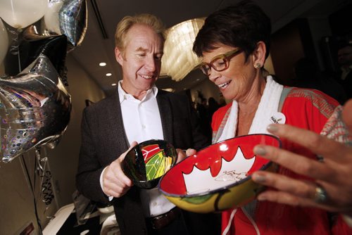 October 13, 2015 - 151013  -  Arlene Wilson, Chairperson of the Empty Bowl Committee at Winnipeg Harvest and Gordon Pollard, President of Winnipeg Harvest compare the bowl of Jonathan Toews (L) with that  of Don Cherry and Ron MacLean Tuesday, October 13, 2015 at the annual Empty Bowl Celebrity Auction fundraiser for Winnipeg Harvest.  John Woods / Winnipeg Free Press