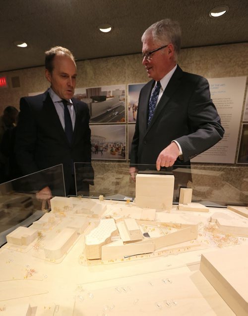 Richard Frost, CEO of the Winnipeg Foundation (right) and Stephen Borys, director & CEO of the Winnipeg Art Gallery, look over a 3-D model of the planned Inuit Art Centre at the WAG on Oct. 14, 2015. The Winnipeg Art Gallery is working towards the creation of an Inuit Art Centre, to which the Winnipeg Foundation is making a grant of $950,000. The centre will be an innovative programming hub that celebrates Inuit art and indigenous cultures through exhibitions, research, education and art making. The WAG holds in trust the worlds largest public collection of contemporary Inuit art. With more than 13,000 pieces, the collection represents half of the WAGs total permanent art collection. Photo by Jason Halstead/Winnipeg Free Press