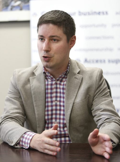 Uber Canada's Public Policy Manager Chris Schafer at the Winnipeg Chamber of Commerce office Wednesday morning for interview. Martin Cash story.Wayne Glowacki / Winnipeg Free Press October 14 2015