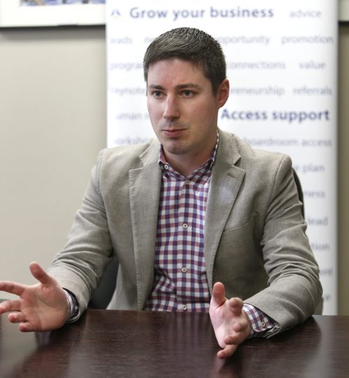 Uber Canada's Public Policy Manager Chris Schafer at the Winnipeg Chamber of Commerce office Wednesday morning for interview. Martin Cash story.Wayne Glowacki / Winnipeg Free Press October 14 2015