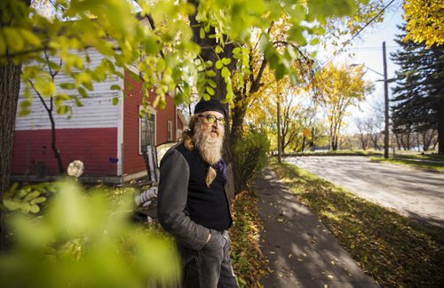 Artist Jordan van Sewell in his riverfront neighbourhood in Winnipeg on Wednesday, Oct. 14, 2015.   (Mikaela MacKenzie/Winnipeg Free Press) --for The Rivers project