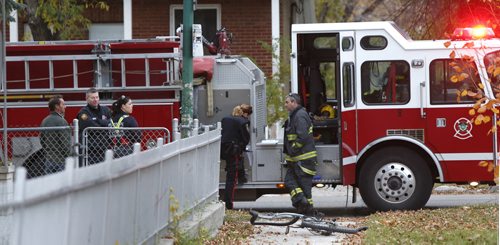 Winnipeg Police and Fire Fighters at the intersection of Manitoba Ave. and McNichol St. after Thursday morning collision incident. Wayne Glowacki / Winnipeg Free Press October 15 2015