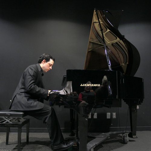 Ecuadorian born David Troya classical pianist plays at the Millennium Library 25th anniversary Skywalk Concerts Thursday-David has a B.A. in business and is a master in piano- He teaches at the University of Manitoba and Conservatory of Music and Arts-Standup Photo -Oct 15, 2015   (JOE BRYKSA / WINNIPEG FREE PRESS)