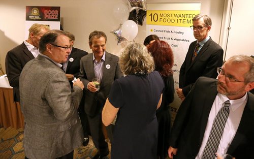 Attendees enjoy cocktails before dinner and the auction. Photo by Jason Halstead/Winnipeg Free Press RE: Social page