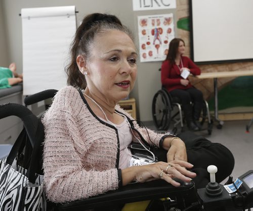 Lori Ross, Chairperson of the Independent Living Resource Centre speaks about problems with Winnipeg Handi Transit at a media event held at the Independent Living Resource Centre Thursday. Kevin Rollason Wayne Glowacki / Winnipeg Free Press October 15 2015