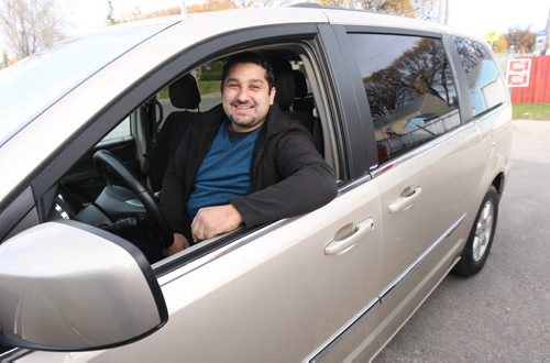 Sargent Blue Jeans co-owner Mohamed Eltassi plans to drive those who are in need to vote from his local mosque in his van-See Carol Sanders story -Oct 14, 2015   (JOE BRYKSA / WINNIPEG FREE PRESS)