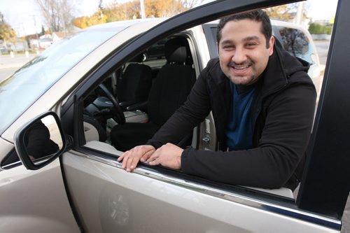 Sargent Blue Jeans co-owner Mohamed Eltassi plans to drive those who are in need to vote from his local mosque in his van-See Carol Sanders story -Oct 14, 2015   (JOE BRYKSA / WINNIPEG FREE PRESS)