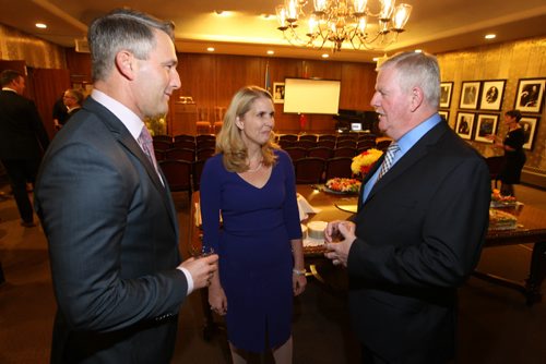 (right) General (Ret'd) Rick Hillier talks to two of the four founding members of TPL, Michael Burns and Bronwen Evans at Government House. They were at a reception and announcement from TPL (True Patriot Love, a foundation that raises money to help military people.  BORIS MINKEVICH / WINNIPEG FREE PRESS  OCT 15, 2015