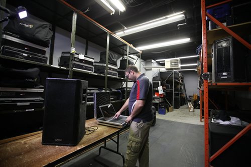 Feature story on locally owned and family run mobile DJ services, Crystal Sound, owner, Tony Braccio Sr.,   will mark it's 40th year in business next year.   Henry Medeiros with Crystal Sound in stockroom.  Oct 15, 2015 Ruth Bonneville / Winnipeg Free Press play