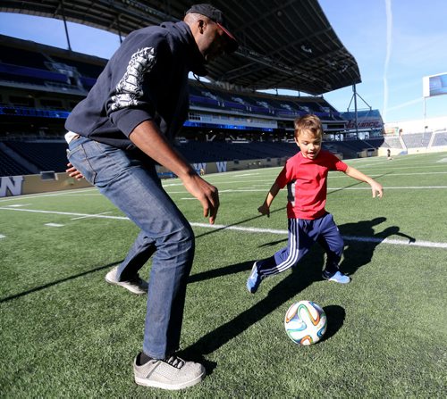 NBA Champion John Salley and Trey Westwood, son of Troy Westwood, during The Celebrity Human Race, an HSC Foundation fundraiser, Saturday, October 17, 2015. (TREVOR HAGAN/WINNIPEG FREE PRESS)