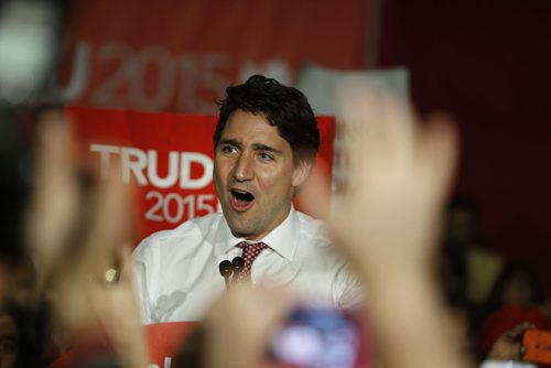 Liberal leader Justin Trudeau is greeted with a roaring, full-house crowd of Liberal supporters as he takes to the podium at St. James Civic Centre Saturday night.   Oct 17, 2015 Ruth Bonneville / Winnipeg Free Press play