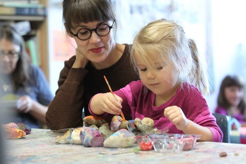 Four-year-old Lucy Swan paints rocks while her mom Sarah watches at  Art City Saturday. Standup photo  Oct 17, 2015 Ruth Bonneville / Winnipeg Free Press play