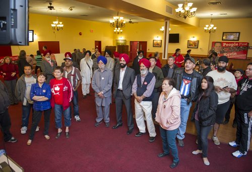 DAVID LIPNOWSKI / WINNIPEG FREE PRESS 151019  Supporters of Incumbent Liberal Kevin Lamoureaux watch election coverage on television at the Punjab Banquet Hall in his Winnipeg North riding Monday October 19, 2015.