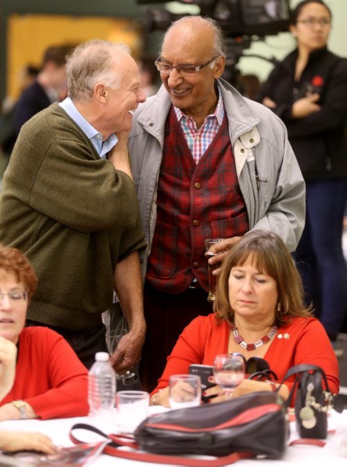 Dr. Jon Gerrard, Dr. Dhali Dhaliwal and Gail Asper watch election restults come in at Jim Carr's Liberal election party, Monday, October 19, 2015. (TREVOR HAGAN/WINNIPEG FREE PRESS)