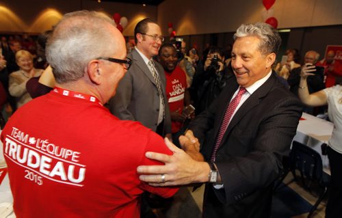 Liberal Dan Vandal party at the Franco-Manitoban Cultural Centre. Here he arrives to a cheering crowd. BORIS MINKEVICH / WINNIPEG FREE PRESS  OCT 19, 2015