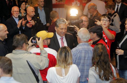 Liberal Dan Vandal party at the Franco-Manitoban Cultural Centre. Here he arrives to a cheering crowd. BORIS MINKEVICH / WINNIPEG FREE PRESS  OCT 19, 2015