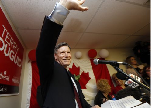 Liberal candidate Terry Duguid waves to supporters at his Winnipeg South HQ after he was elected Monday night.  Larry Kusch story  Wayne Glowacki / Winnipeg Free Press October 19 2015