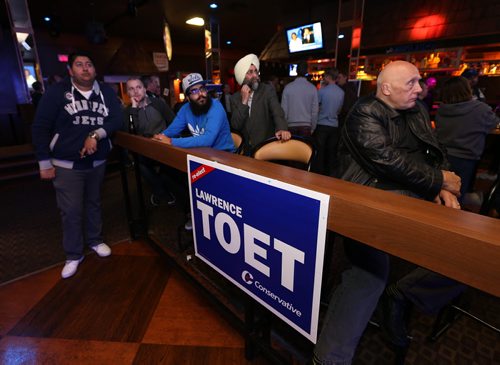 Supporters of Conservative candidate for Elmwood-Transcona, Lawrence Toet, wait for him at The Oak bar on Regent Avenue West.on Mon., Oct. 19, 2015. Photo by Jason Halstead/Winnipeg Free Press