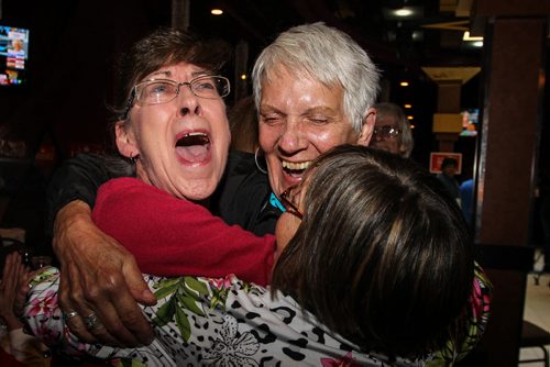 Supporters for Robert Falcon Ouellette, Liberal candidate for Winnipeg Centre, celebrate a huge win, upsetting incumbent NDP Pat Martin in the federal election Monday, October 19, 2015. 151019 - Monday, October 19, 2015 -  MIKE DEAL / WINNIPEG FREE PRESS