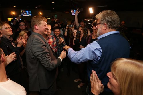 NDP candidate for Elmwood-Transcona, Daniel Blaikie, celebrates victory with his father Bill Blaikie at the New Cavalier Inn on Regent Avenue West. on Mon., Oct. 19, 2015. Photo by Jason Halstead/Winnipeg Free Press