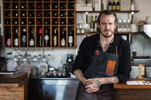 Head chef of Enoteca Scott Bagshaw poses in his restaurant, which was included in En Route's top 10 new Canadian restaurants, in Winnipeg Thursday, Oct. 22, 2015.   (Mikaela MacKenzie/Winnipeg Free Press)