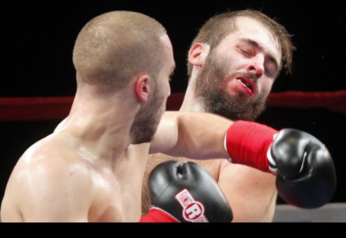 HIGH STAKES HAVOC 2 - Presented by King John Boxing @ Club Regent Casino Event Centre. Under card boxers Kane Heron from Toronto beats up Lee Spurgron from Kentucky.(in red). Heron won in three rounds.  BORIS MINKEVICH / WINNIPEG FREE PRESS  OCT 22, 2015