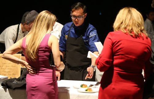 L-R: Cornerstone chef Norm Patron serves up a dish at the Gold Medal Plates food and wine event at the RBC Convention Centre Winnipeg on Oct. 16, 2015. Photo by Jason Halstead/Winnipeg Free Press RE: Social Page for Oct. 24, 2015
