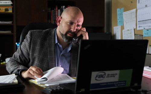 Nate Brideau  Corporate Tax Specialist, Business Consultant with FBC works in his office on Portage Ave.  He recently helped a client deal with a scam artist trying to bill her with close to $5,000 of charges. See Kevin Rollason's story.   Oct 23, 2015 Ruth Bonneville / Winnipeg Free Press