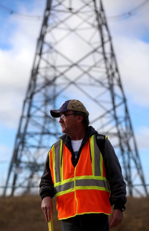 Bill McCausland continues the search for Thelma Krull near The Oasis, Sunday, October 25, 2015. (TREVOR HAGAN/WINNIPEG FREE PRESS)