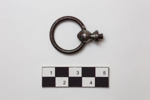 Scott Stephen, an historian at Parks Canada, showcases a few artifacts in the collections at the Parks Canada office in Winnipeg that were recovered from various digs at the forks and area. Drawer Pull (21K17F1-1): Recovered from North Point in1988 from the railway fill. This handle is plated with nickel. Whereas it was possible to make iron handles on site, the HBC would have had to import nickel artifacts.  The design of the handle suggests that it was driven and clinched into the wood and its small size suggests it could have been a desk drawer handle. 150924 - Thursday, September 24, 2015 -  MIKE DEAL / WINNIPEG FREE PRESS