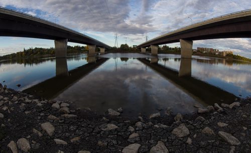 The Red River flows underneath the spans of the Bishop Grandin bridge. 150923 - Wednesday, September 23, 2015 -  MIKE DEAL / WINNIPEG FREE PRESS