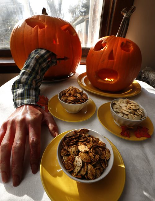 Food Front. Pumpkin seeds recipes are Spicy Nut Sweet in foreground, Butter Salt at right and Ironic Coating Pumpkin Pie Spice in back. For story of pumpkin seed recipes and carving ideas from the book Extreme Pumpkins by Tom Nardone. Wendy King story. Wayne Glowacki / Winnipeg Free Press October 26 2015