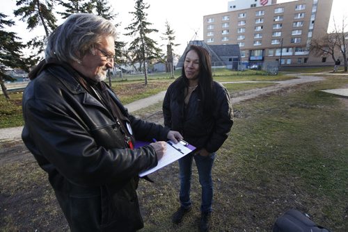 October 26, 2015 - 151026  -  Al Wiebe completes the 2015 Street Homeless Census with June Moore outside Thunderbird House Monday, October 26, 2015. A census is being taken of Winnipeg's homeless population. John Woods / Winnipeg Free Press
