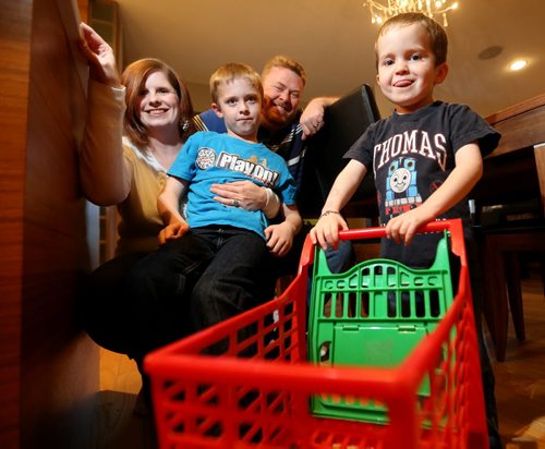 Liz, Will, 7, Kent and Max Bannister, 4. Max has been chosen by Starlight Canada , a charity that helps sick kids, to run through Toys'R'Us to get free toys, Monday, October 26, 2015. (TREVOR HAGAN/WINNIPEG FREE PRESS)