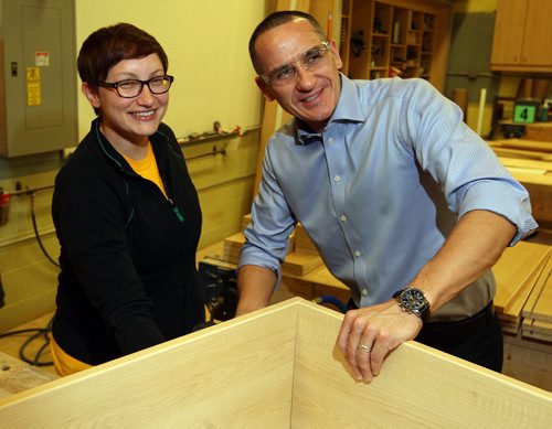 The province is launching an apprenticeship program to encourage women to get into the trades. Student named Aubrey Doerksen and Kevin Chief, Minister of Jobs and the Economy  do some cabinet building in the Notre Dame campus woodshop. BORIS MINKEVICH / WINNIPEG FREE PRESS  OCT 27, 2015