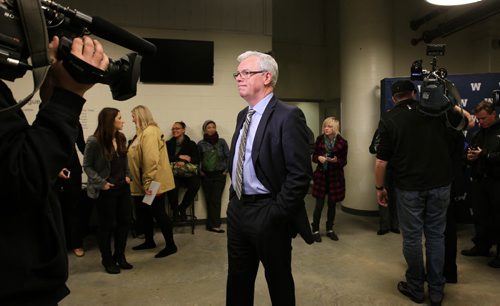 Premier Greg Selinger makes his way out of a news conference after being bombarded with questions by the media about major repairs needed to fix drainage issues at the newly built stadium after a press conference on Thursday.     Oct 27, 2015 Ruth Bonneville / Winnipeg Free Press